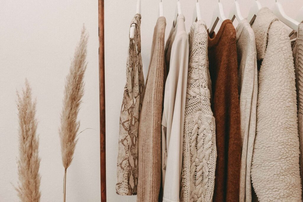 sustainable clothes hanging on a rack